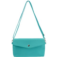 Color Medium Turquoise Removable Strap Clutch Bag by Kultjers